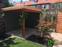 Tuinaanleg in Haarlem schuur op maat en overkapping