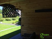 Overkapping met sedum op het dak