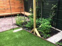Tuinaanleg, harmonicadoek op pergola Overveen