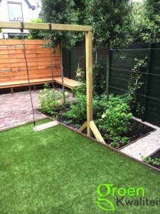 Tuinaanleg, harmonicadoek op pergola Overveen