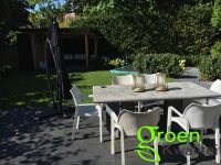 Tuinaanleg met overkapping in Heemstede
