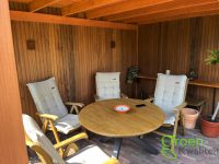 Zitten in veranda